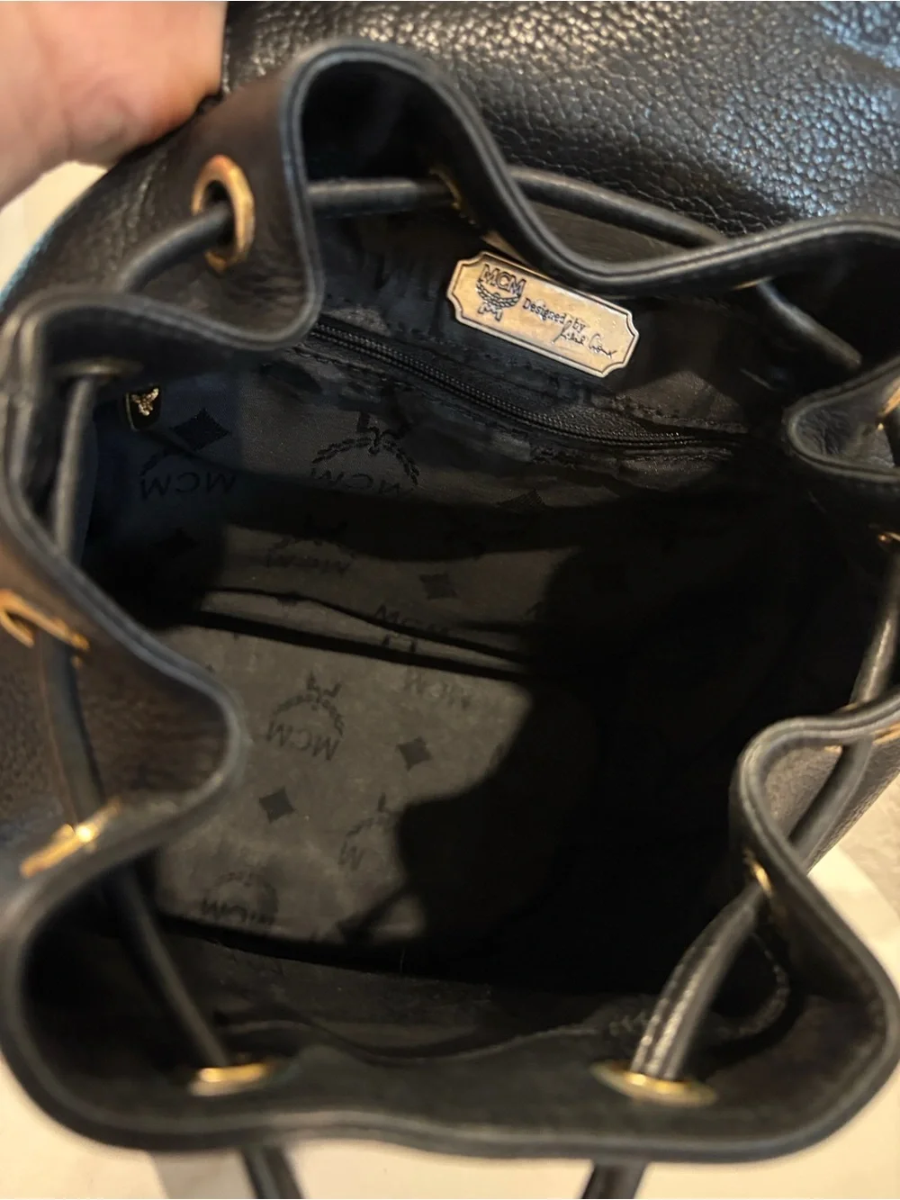 MCM Black Leather Drawstring Backpack with Gold Hardware